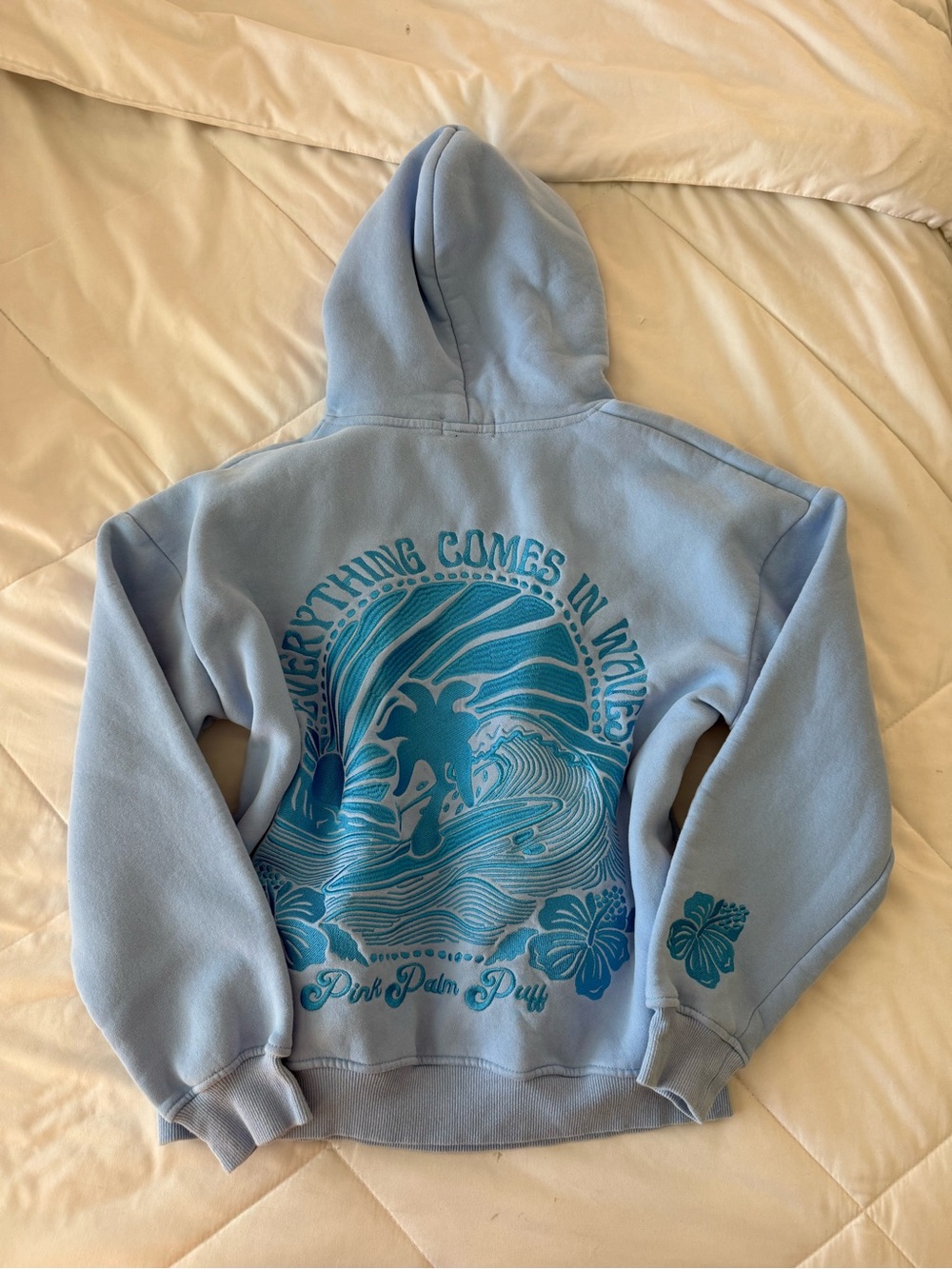 Pink Palm Puff Light Blue Hoodie with Teal Wave Graphic